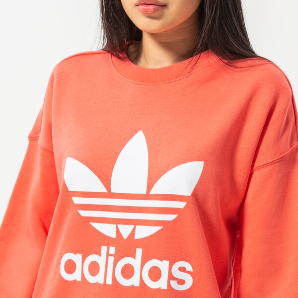 Sieviešu džemperis ADIDAS DŽEMPERIS TRF CREW SWEAT he9537 krāsa oranža
