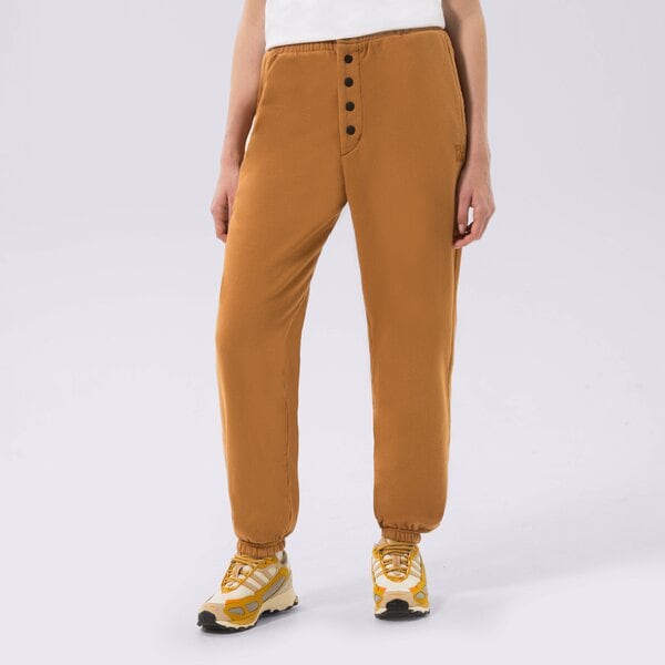 Sieviešu bikses PUMA BIKSES PUMA INFUSE SWEATPANTS 535644-74 krāsa sinepju dzeltenā