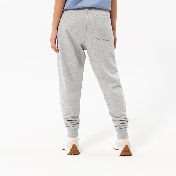 Vīriešu bikses NEW BALANCE BIKSES NB ESSENTIALS STACKED LOGO SWEATPANT mp03558ag krāsa pelēka