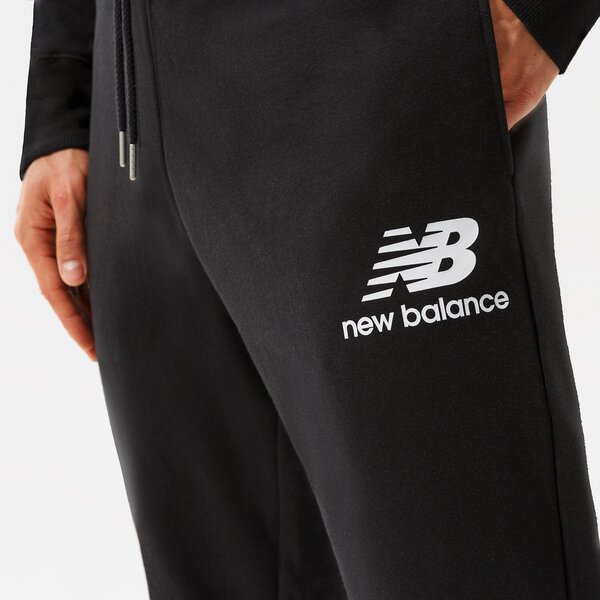 Vīriešu bikses NEW BALANCE BIKSES NB ESSENTIALS STACKED LOGO SWEATPANT mp03558bk krāsa melna
