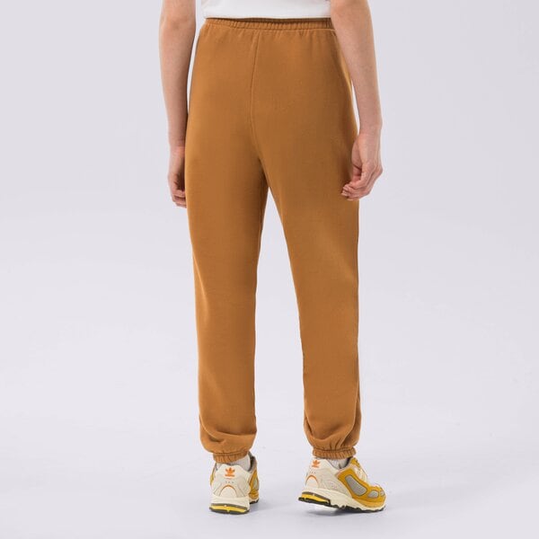 Sieviešu bikses PUMA BIKSES PUMA INFUSE SWEATPANTS 535644-74 krāsa sinepju dzeltenā