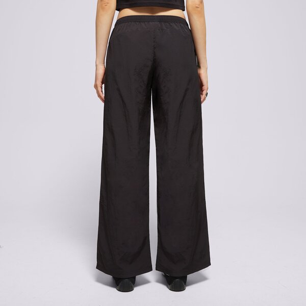Sieviešu bikses PUMA BIKSES RELAXED WOVEN ZIP-OFF PANTS OP 629808 01 krāsa melna