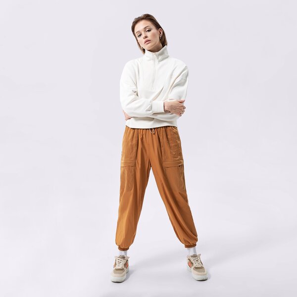 Sieviešu bikses PUMA BIKSES PUMA INFUSE WOVEN PANTS 536106-74 krāsa dzeltena