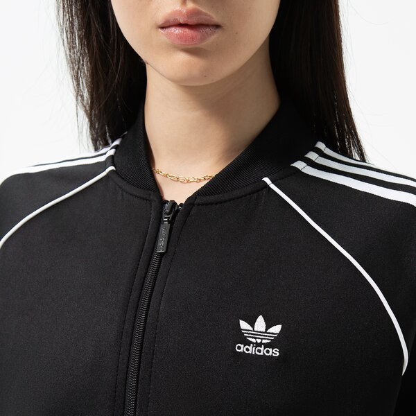 Sieviešu džemperis ADIDAS DŽEMPERIS AR RĀVĒJSLĒDZĒJU  SST TRACKTOP PB gd2374 krāsa melna