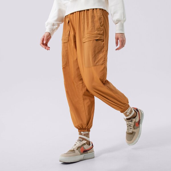 Sieviešu bikses PUMA BIKSES PUMA INFUSE WOVEN PANTS 536106-74 krāsa dzeltena