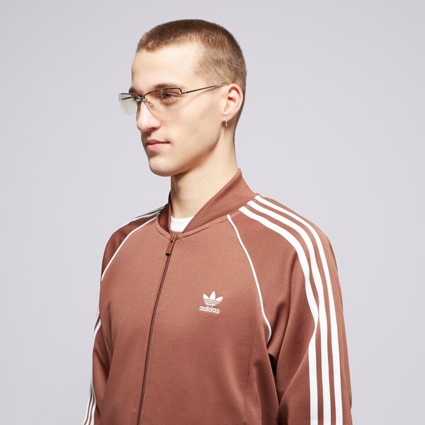 Vīriešu džemperis ADIDAS DŽEMPERIS AR RĀVĒJSLĒDZĒJU  SST TT iy9855 krāsa brūna