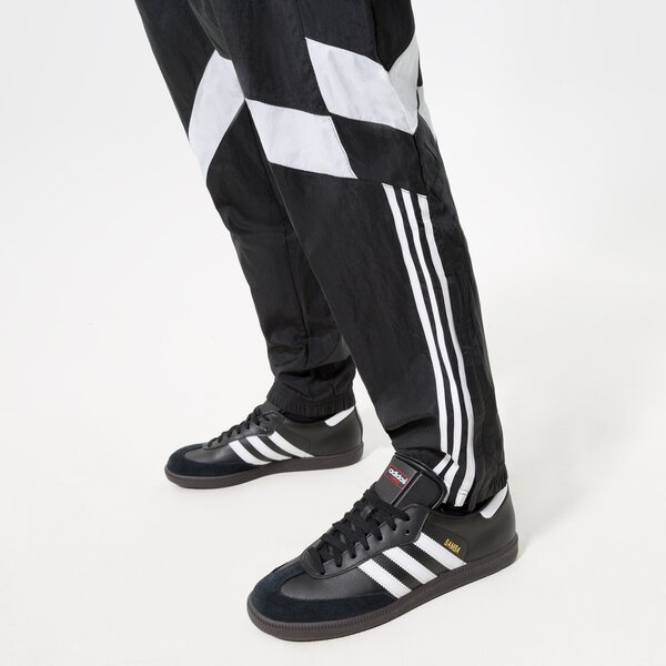 Vīriešu bikses ADIDAS BIKSES WOVEN TP hk7325 krāsa melna