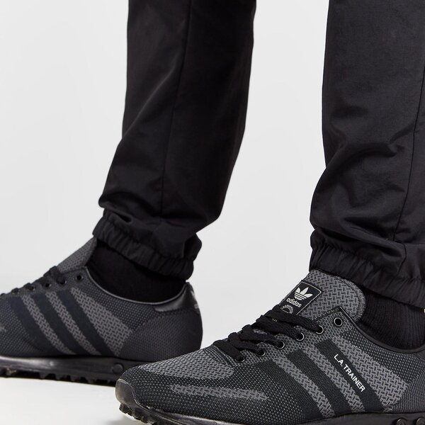 Vīriešu bikses ADIDAS BIKSES CM WOVEN PANT GRAPHIC is6113 krāsa melna