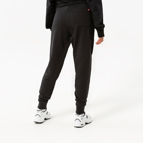 Vīriešu bikses NEW BALANCE BIKSES NB ESSENTIALS STACKED LOGO SWEATPANT mp03558bk krāsa melna