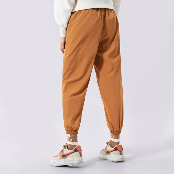 Sieviešu bikses PUMA BIKSES PUMA INFUSE WOVEN PANTS 536106-74 krāsa dzeltena