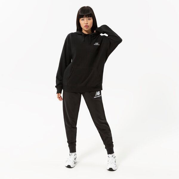 Vīriešu bikses NEW BALANCE BIKSES NB ESSENTIALS STACKED LOGO SWEATPANT mp03558bk krāsa melna