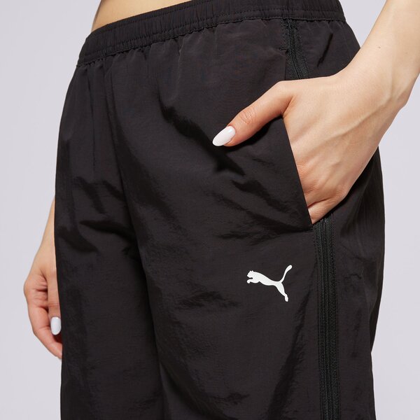 Sieviešu bikses PUMA BIKSES RELAXED WOVEN ZIP-OFF PANTS OP 629808 01 krāsa melna