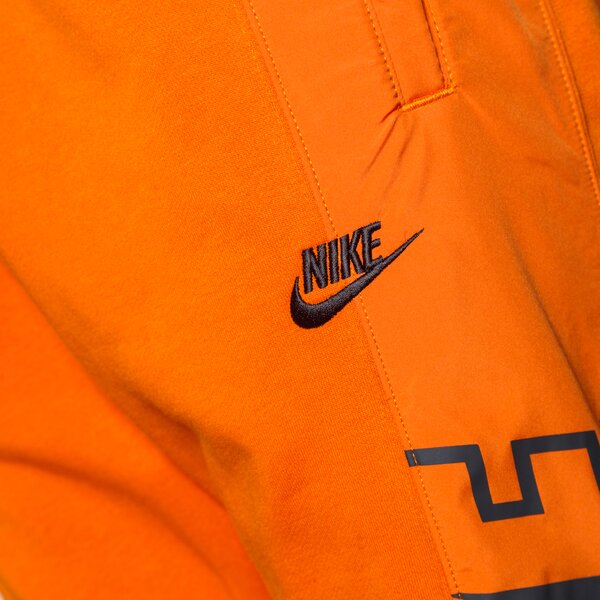 Vīriešu bikses NIKE BIKSES SPORTSWEAR cz9942-893 krāsa oranža
